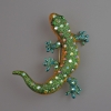 Broche-colgante «Lagartija» verde y amarilla, esmalte, cristales de strass rosados y verdes, metal dorado 54x46 mm